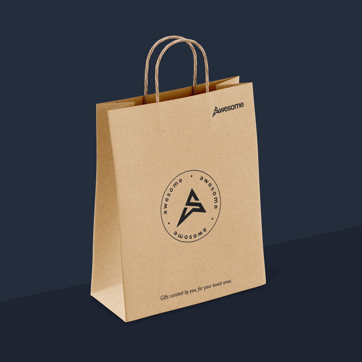 A kraft paper bag with the Awesome seal in black, the wordmark in the corner and the tagline along the bottom