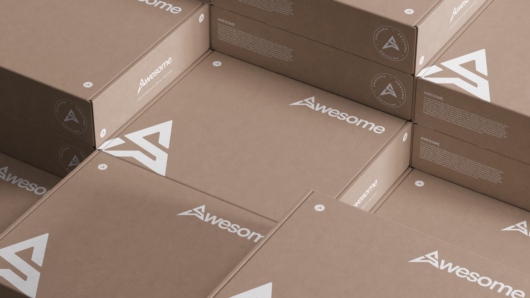 Stacked kraft gift boxes printed in white with the Awesome wordmark, monogram and seal