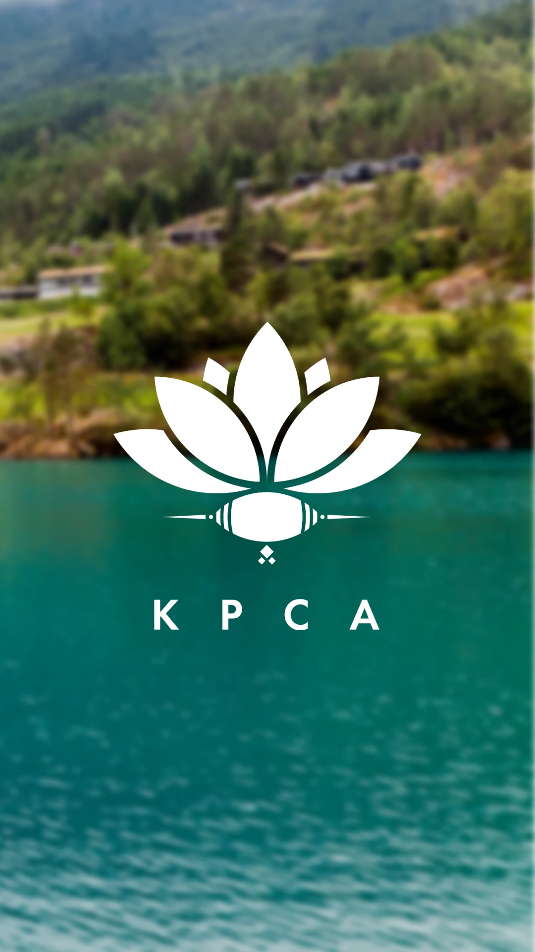 KPCA lotus mark and wordmark in white over a turquoise mountain lake